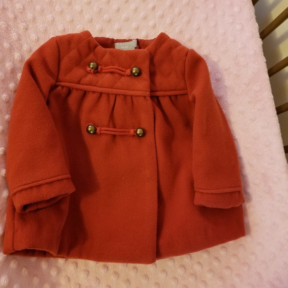 red baby coat
